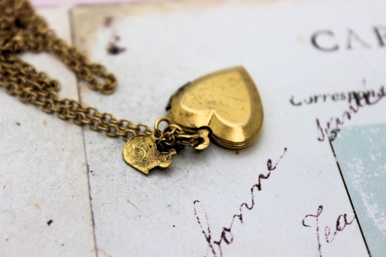 gold ox jewelry snail heart locket necklace
