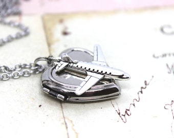 airplane. heart locket necklace. antiqued shiny silver tone jewelry