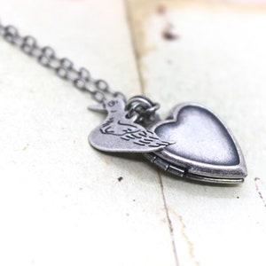 duck. locket necklace. in silver ox image 1