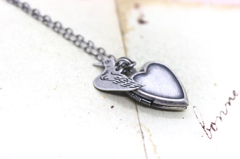 duck. locket necklace. in silver ox image 1