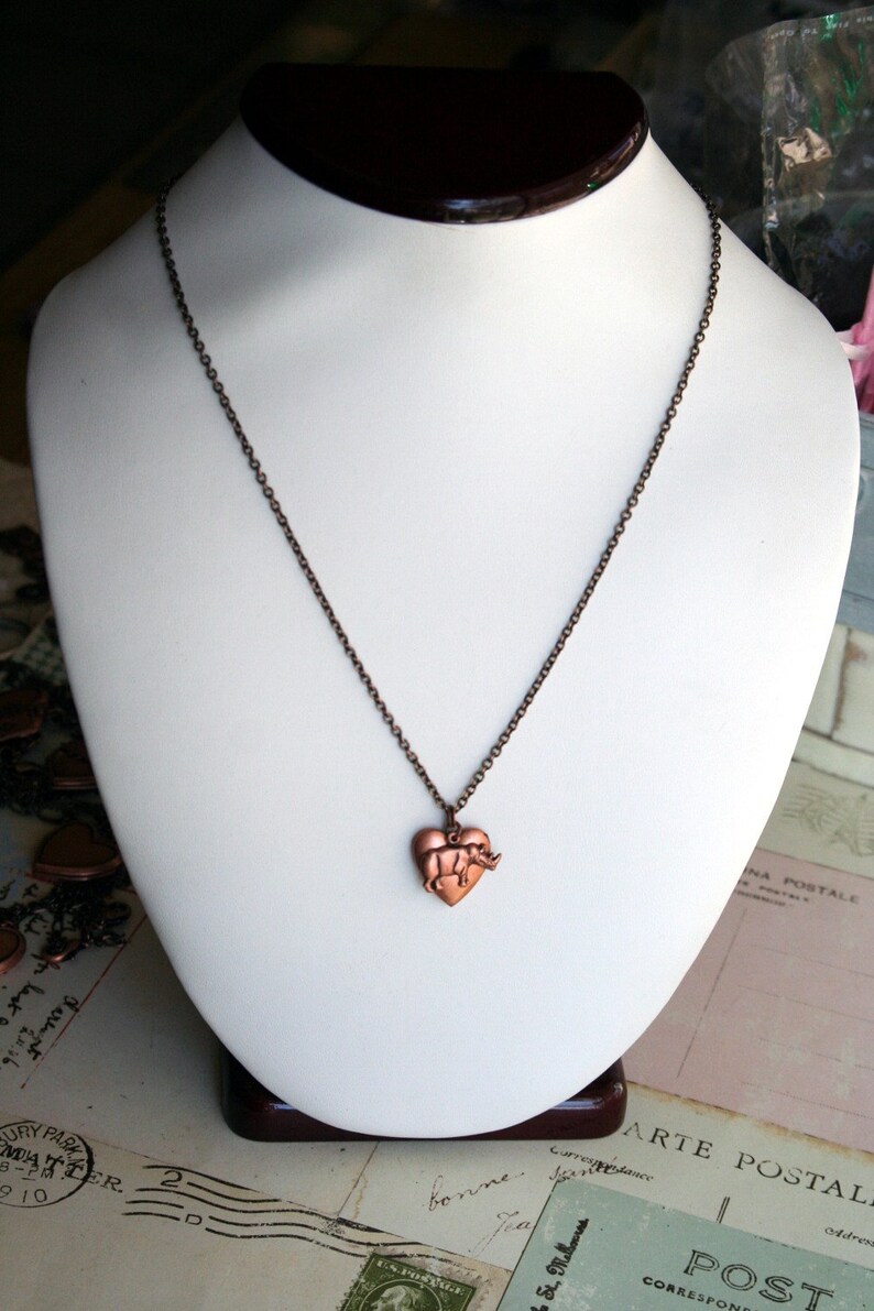 Rhino. heart locket necklace. copper ox Etsy