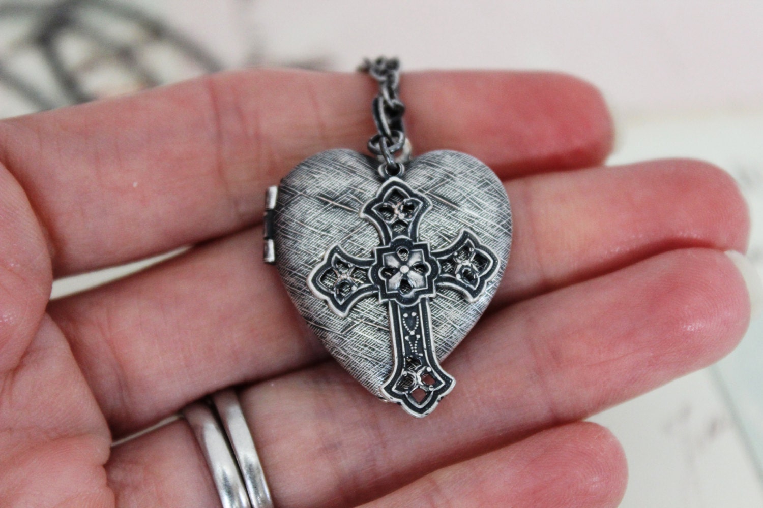 Heart locket with cross deals