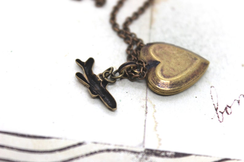 tiny airplane. locket necklace. in brass ox image 4