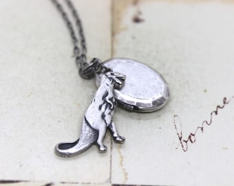 T rex. locket necklace. silver ox jewelry