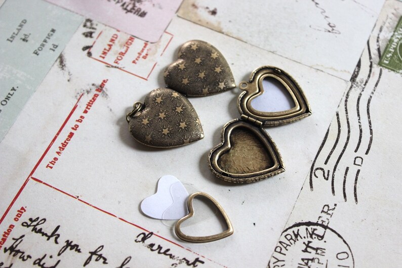in silver ox jewelry heart locket necklace moon and stars