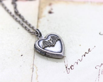 bat. heart locket necklace. silver ox jewelry now with a silver tone bat or silver ox bat