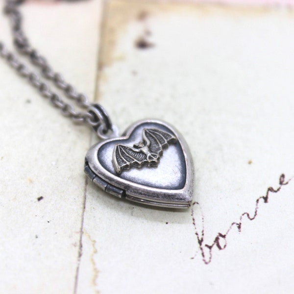 bat. heart locket necklace. silver ox jewelry now with a silver tone bat or silver ox bat