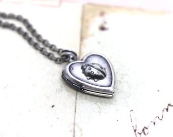 ladybug. locket necklace. in silver ox glued version