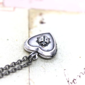 ladybug. locket necklace. in silver ox image 3