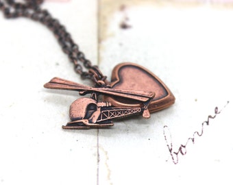 helicopter. heart locket necklace. copper ox