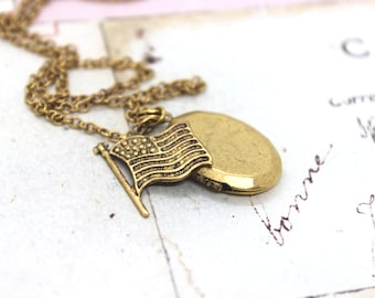 flag locket necklace. gold ox bigger flag