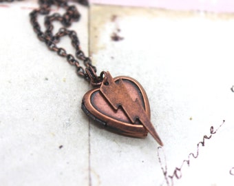 lightning bolt. heart necklace. copper ox