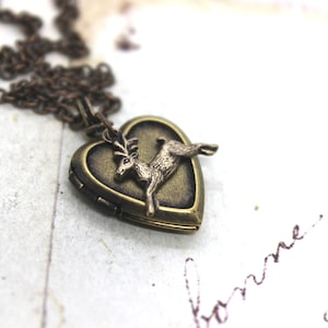 deer heart locket necklace. brass ox