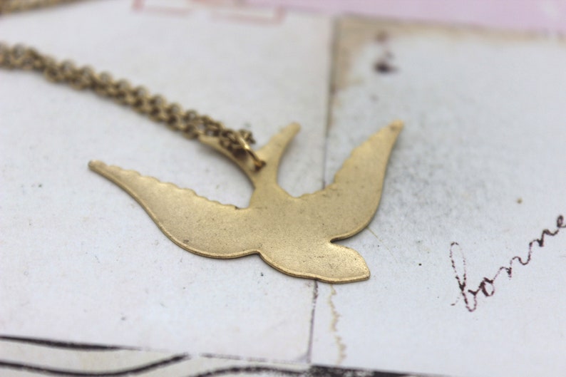 necklace in gold ox jewelry swallow bird
