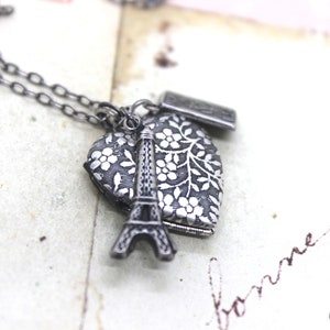 Eiffel tower. heart locket necklace. in silver ox