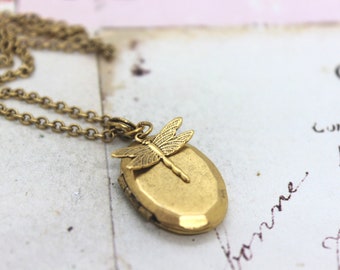 dragonfly locket necklace. gold ox jewelry raised wings