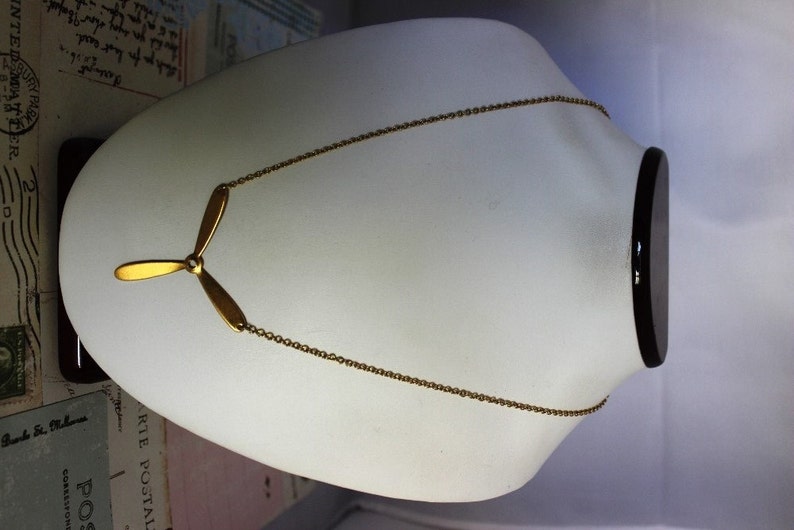 propeller. necklace. gold ox jewelry image 5