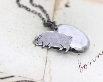 pig. locket necklace. in silver ox