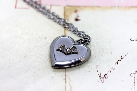 bat. heart locket necklace. in antiqued shiny silver tone