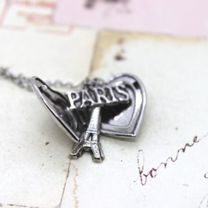paris eiffel. heart locket necklace. in antiqued shiny silver tone jewelry