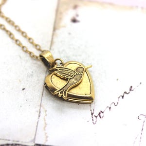 hummingbird. locket necklace. gold ox jewelry with bail