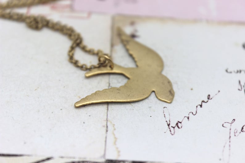necklace in gold ox jewelry swallow bird