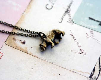 bear necklace. in antiqued brass color