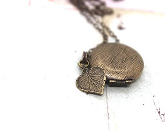 leaf locket necklace. brass ox jewelry