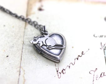 mouse. necklace. silver ox color