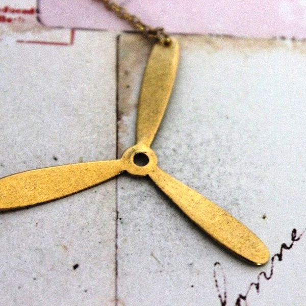 propeller. necklace. gold ox jewelry