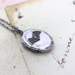 bat. heart locket necklace. silver ox jewelry now with a silver tone bat or silver ox bat image 3