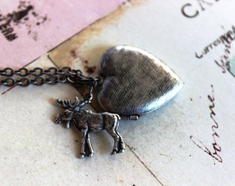 moose. locket necklace. silver ox with etched lines heart