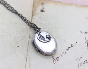 moon and star. locket necklace. in silver ox