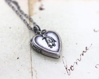 penguin. heart locket necklace. silver ox