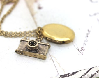 camera. locket necklace. in gold ox