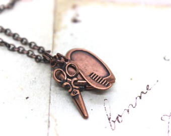 hairdresser. heart locket necklace. in copper ox