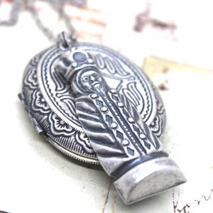 king chess piece locket necklace. silver ox color