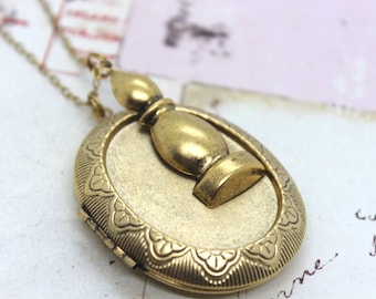 toren. medaillon ketting. gouden os sieraden jumbo ovaal medaillon