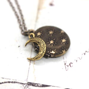 moon and stars. round locket necklace. in brass ox and gold ox
