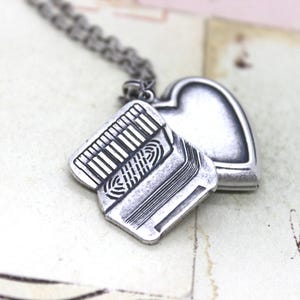 accordion heart locket necklace silver ox