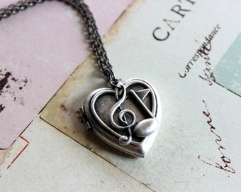 G Clef music notes. heart locket necklace. silver ox meduim locket