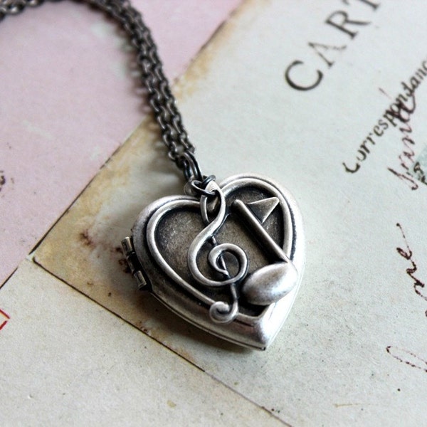 G Clef music notes. heart locket necklace. silver ox meduim locket