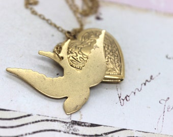 bird heart locket necklace. gold ox jewelry