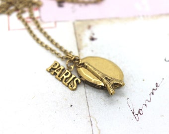 Paris. oval locket necklace. gold ox jewelry Eiffel tower
