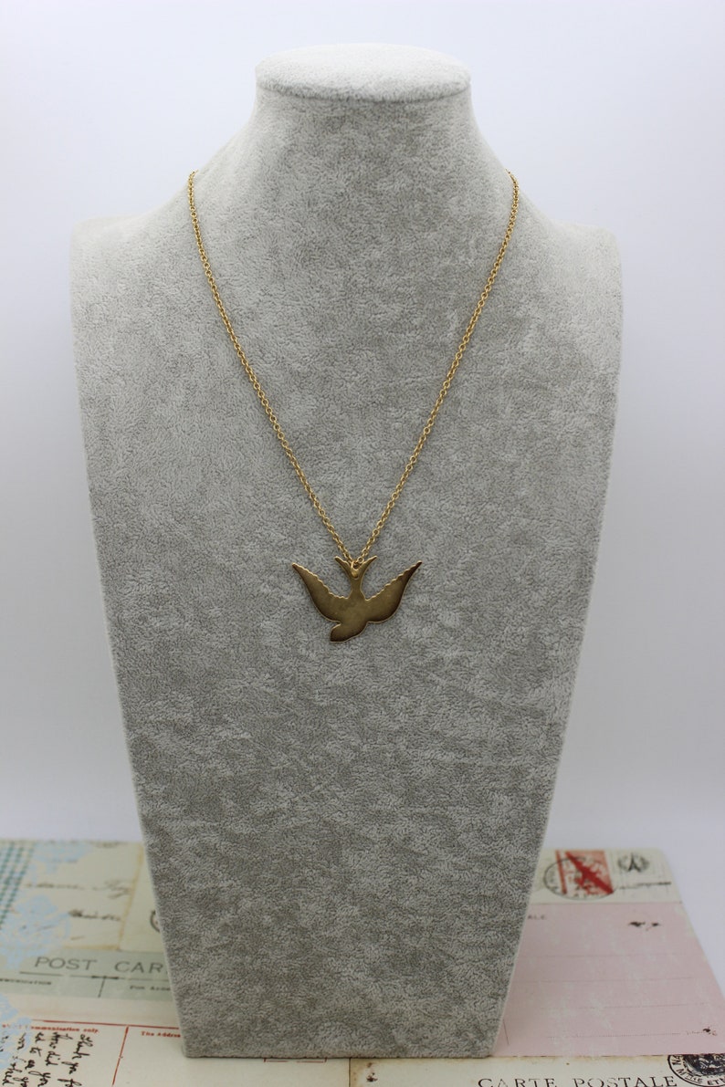necklace in gold ox jewelry swallow bird