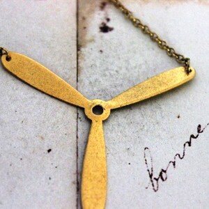 propeller. necklace. gold ox jewelry image 2