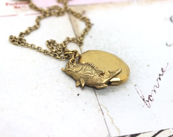 fish locket necklace. gold ox jewelry