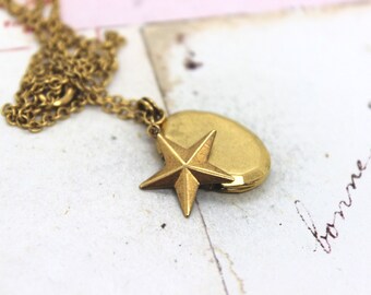 star. oval locket necklace. gold ox jewelry