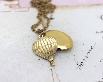 hot air balloon. oval locket necklace. gold ox jewelry