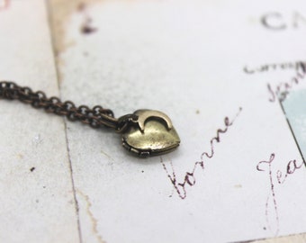 moon. locket necklace. in brass ox itty bitty tiny locket